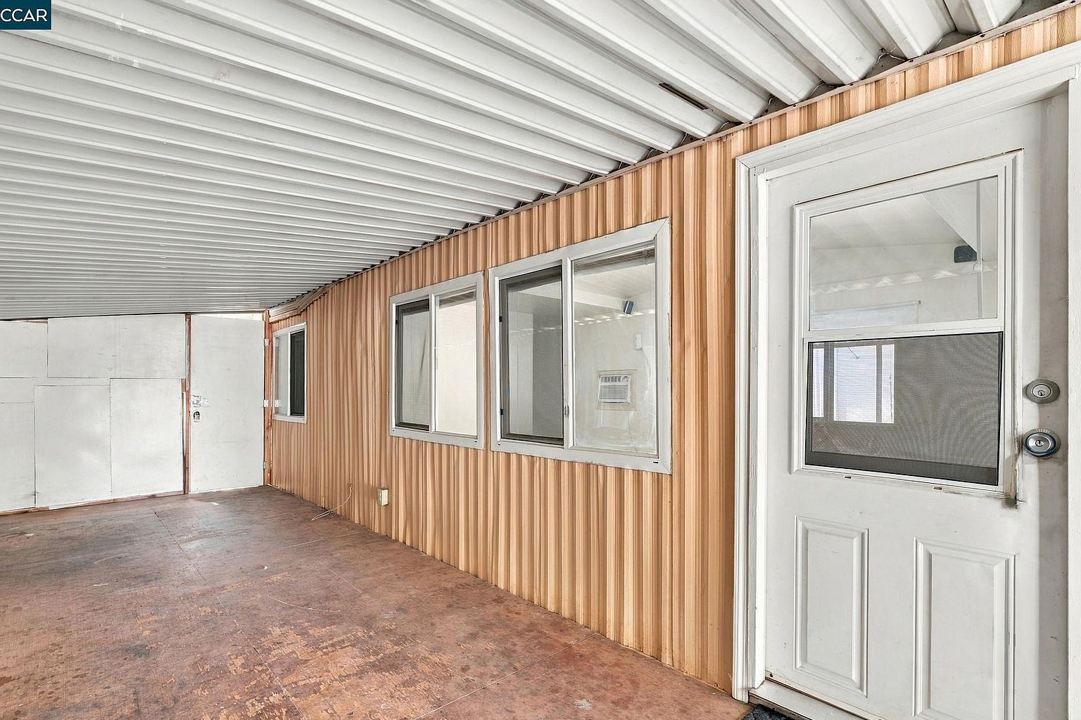 Covered patio and entry at 841 W Brannan Island Rd Spc 5