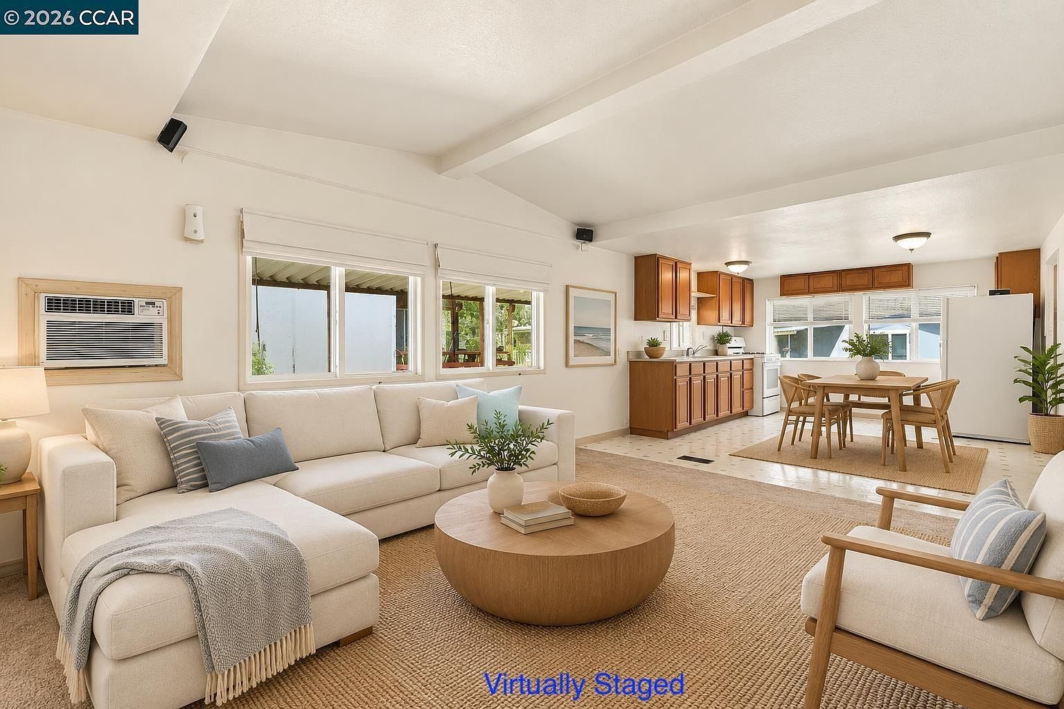 Virtually staged living room and kitchen at 841 W Brannan Island Rd Spc 5
